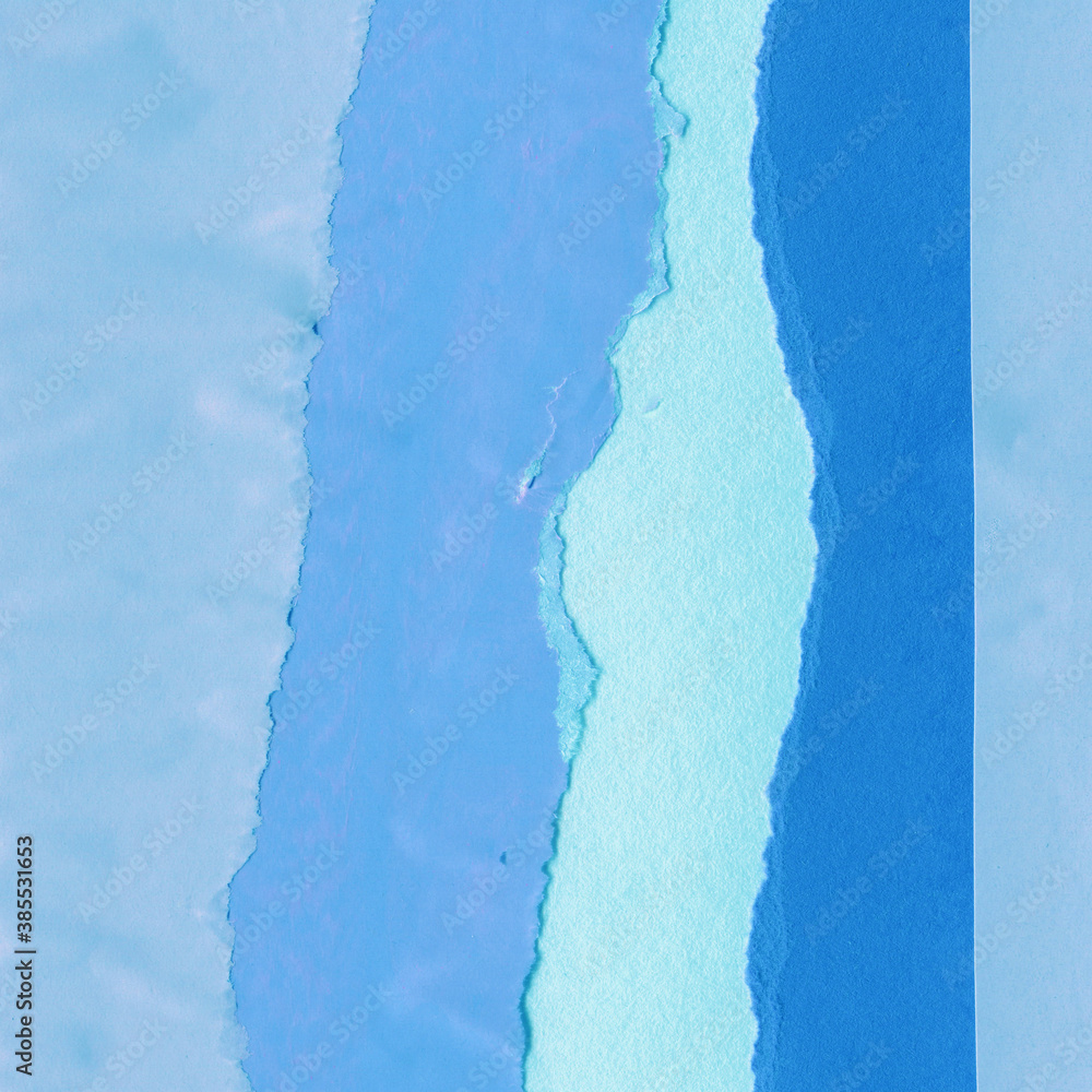 Blue torn paper collage close-up. Texture made from various paper and cardboard parts. Damaged old paper background. Vintage blank wallpaper. Material design backdrop. Blue torn paper collage close-up. Texture made from various paper and cardboard parts. Damaged old paper background. Vintage blank wallpaper. Material design backdrop.