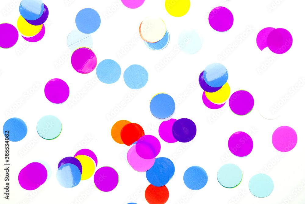 Festive, multicolored paper confetti in the form of circles isolated on white background