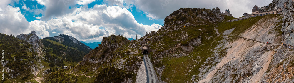 High resolution stitched panorama of a beautiful alpine summer view with dramatic clouds at the famous Wendelstein near Bayrischzell, Bavaria, Germany