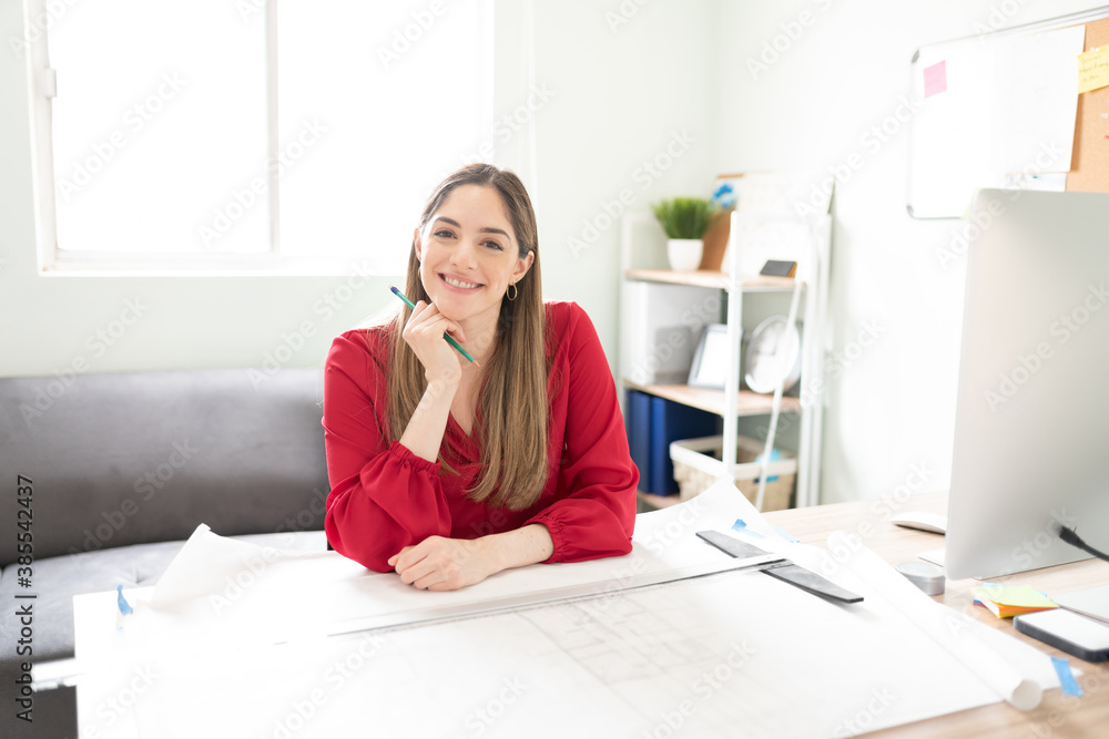 Happy architect in her office Happy architect in her office