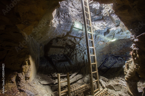 Underground gold ore mine tunnel with ladder stairs