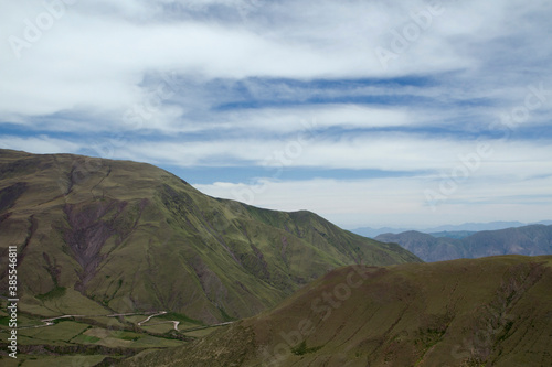 The green valley, meadow and hills under a beautiful deep blue sky. Aerial view of the popular landmark Bishop's slope mountaintop, in Salta, Argentina.