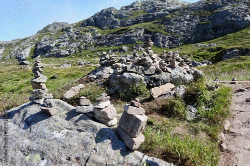 hiking in the mountains and rock stacking