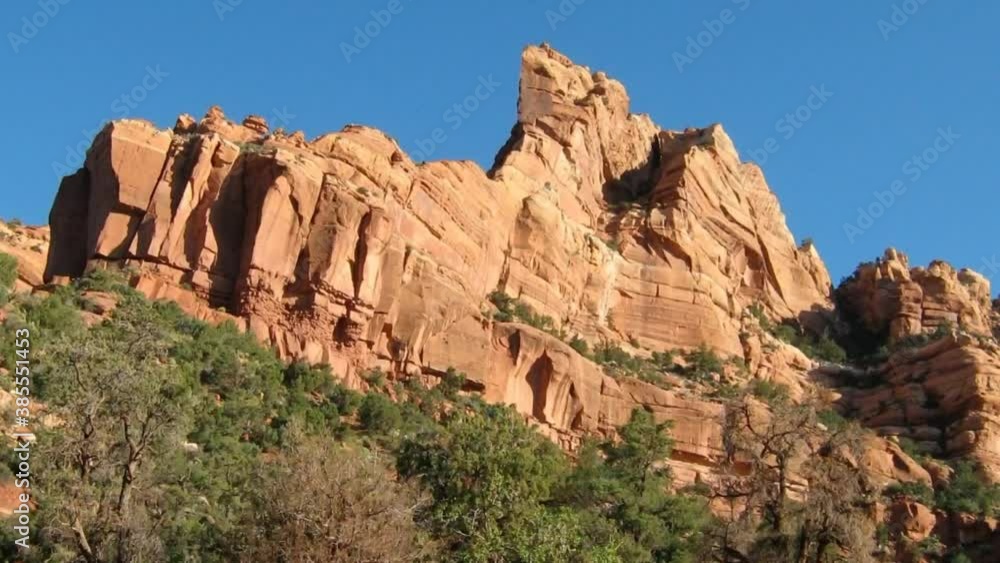 Side view of mountain and clouds in daytime Side view of mountain and clouds in daytime