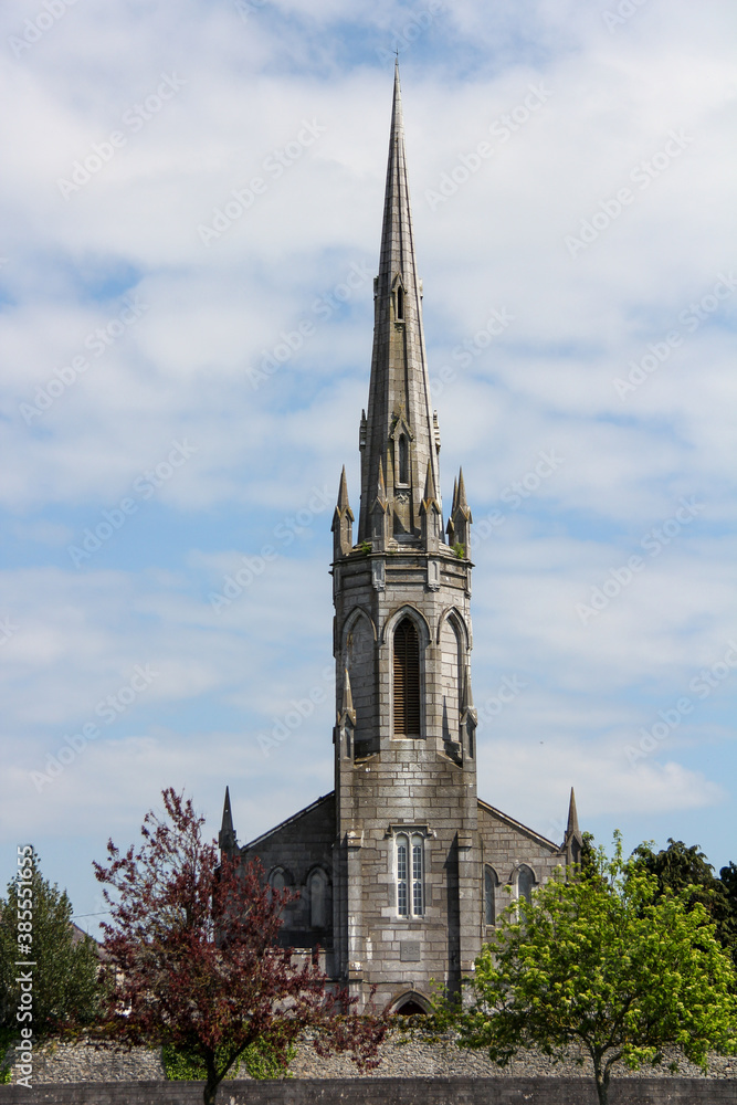 Stone cathedral with a very pronounced spike at the top