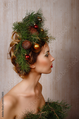 Fashion young Woman in Christmas Tree Dress