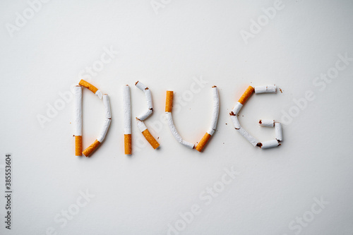 Inscription word DRUG made out of cigarettes top view