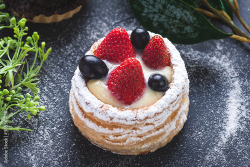 cake with berries and sugar