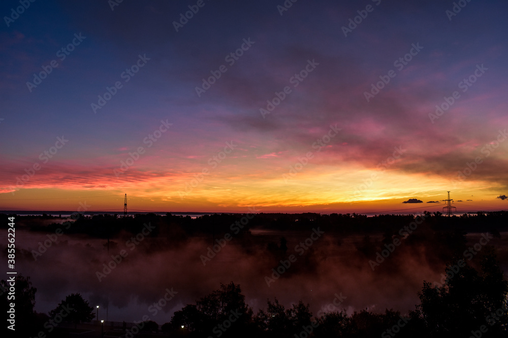Obraz premium sunset over the river