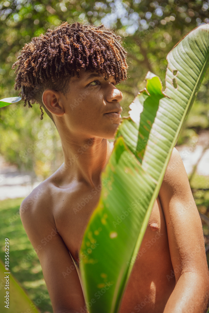 Shirtless Young African Brazilian Man With Trendy Hairstyle Looking Shirtless Young African Brazilian Man With Trendy Hairstyle Looking