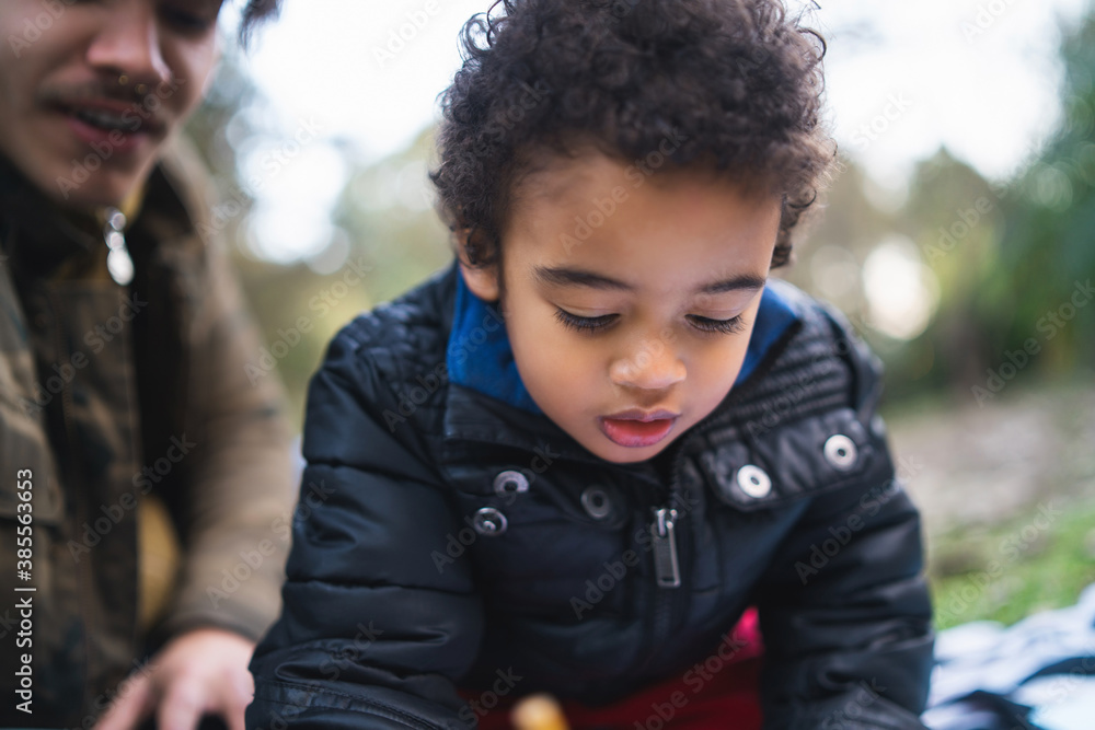 African american little boy with his father.