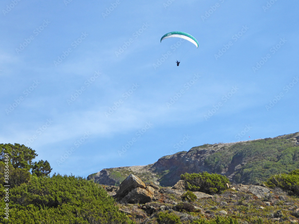Paragliding above Salgado beach, Portugal Paragliding above Salgado beach, Portugal
