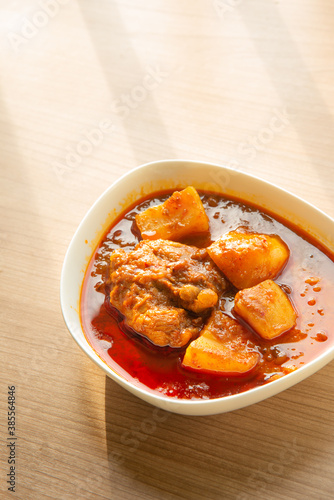 Thai Chicken massaman curry - Thai chicken and potato curry in coconut milk and herb eat with white rice