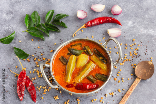 Photography Popular South Indian Lentil Dish, Vertical Photo, Directly Above on Dark Backgro