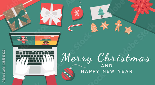 Santa Claus hand using a laptop video conferencing online with people and virtual discussing on Christmas holiday with Merry Christmas and happy new year text, vector flat lay illustration