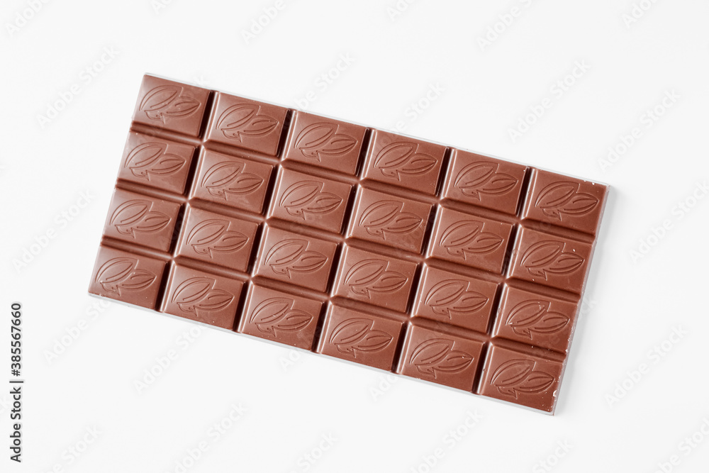 Milk chocolate bar isolated on white background Milk chocolate bar isolated on white background
