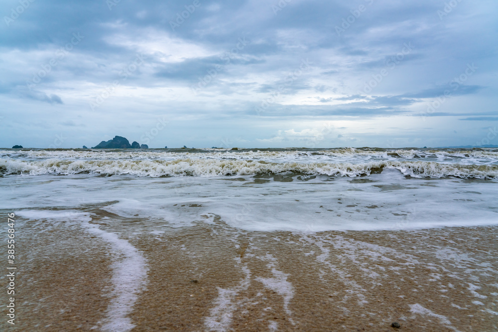 The  waves hit the shore at Ao Nang, Krabi, Thailand