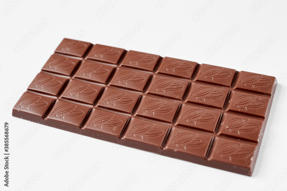 Milk chocolate bar isolated on white background Milk chocolate bar isolated on white background
