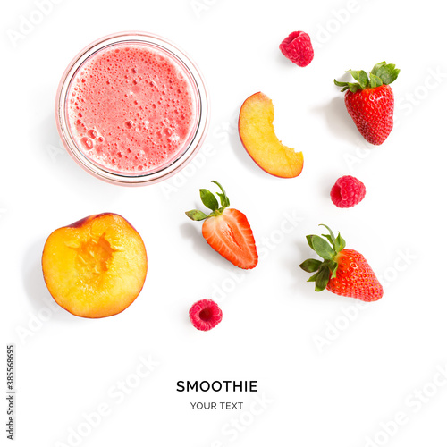 Fototapeta Naklejka Na Ścianę i Meble -  Creative layout made of strawberry and peach smoothie. Flat lay. Food concept. Smoothie on the white background.