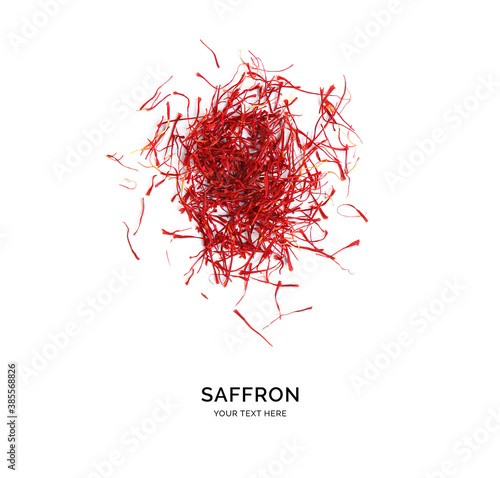 Creative layout made of saffron on white background. Flat lay. Food concept. photo