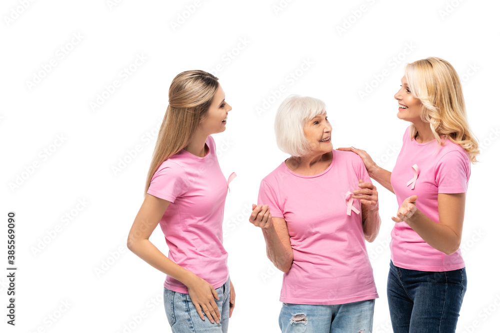 Obraz premium Women with pink ribbons of breast cancer awareness talking isolated on white