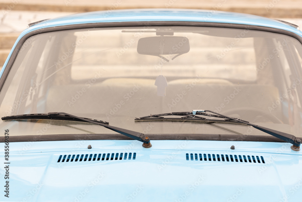 Naklejka premium Retro car windshield with windshield wipers