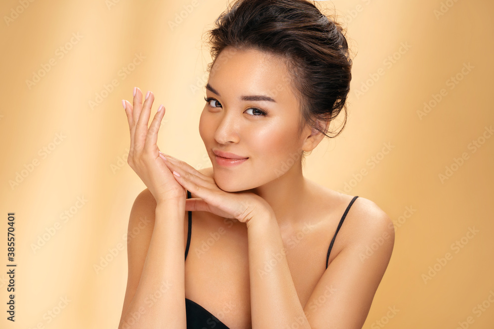 Beautiful woman with perfect makeup on beige background. Beauty and skin care concept Beautiful woman with perfect makeup on beige background. Beauty and skin care concept