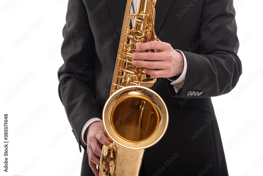 Fototapeta premium Saxophonist with a saxophone in his hands on a white background.