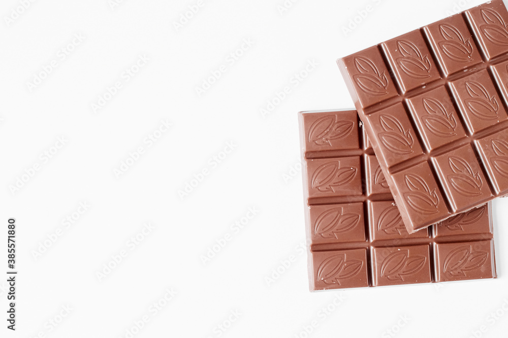 close up a chocolate bar isolated on white background close up a chocolate bar isolated on white background