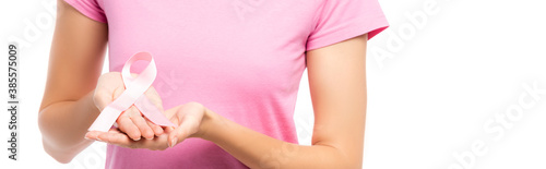 Wallpaper Mural Panoramic orientation of young woman showing pink ribbon isolated on white Torontodigital.ca