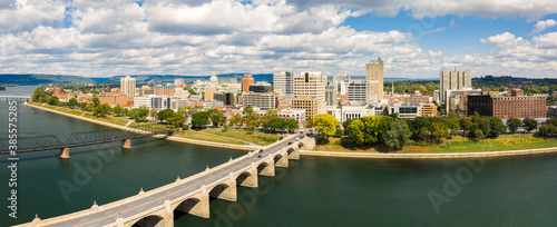 Harrisburg, Pennsylvania aerial skyline panorama on a sunny day. Harrisburg is the capital of state and houses the government for the U.S. state of Pennsylvania photo
