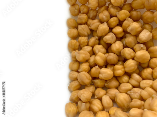 Garbanzo beans or chickpea spread on an isolated white background