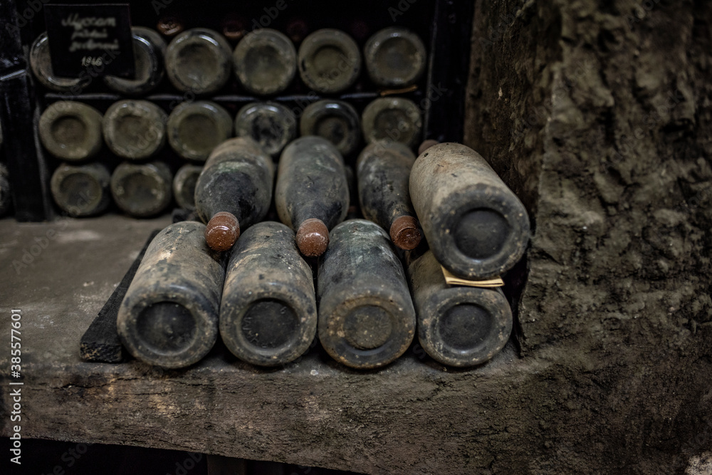 old bottles with wine stored in special cellars and stored using special technology old bottles with wine stored in special cellars and stored using special technology