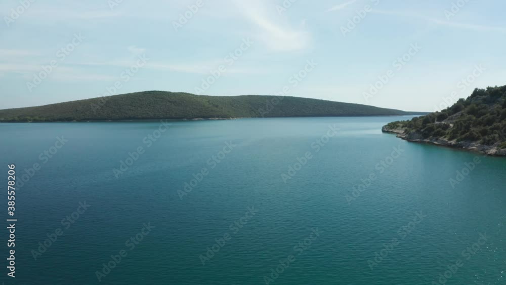Aerial panorama shot of small island group on a sunny day. Aerial shot of the area around Luca beach, Croatia. Aerial panorama shot of small island group on a sunny day. Aerial shot of the area around Luca beach, Croatia.
