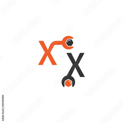 Letter X  logo icon forming a wrench and bolt design