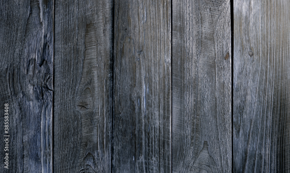 Old wooden vertical oriented boards. Old wooden vertical oriented boards.