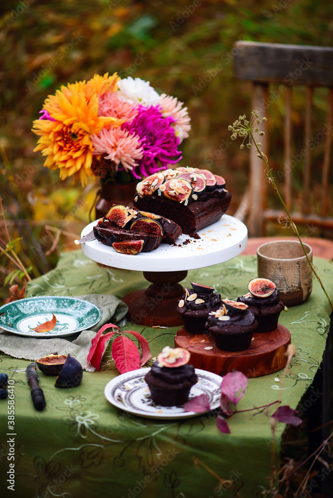 Chocolate fig loaf cake in the autumn forest.style vintage