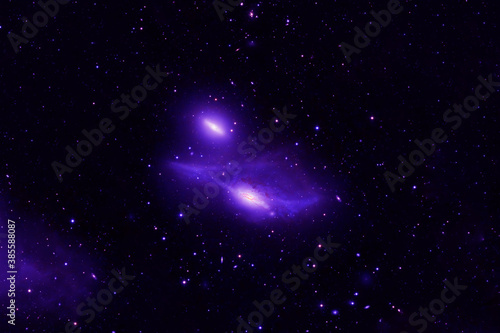 Beautiful purple galaxy in deep space. Elements of this image furnished by NASA were.