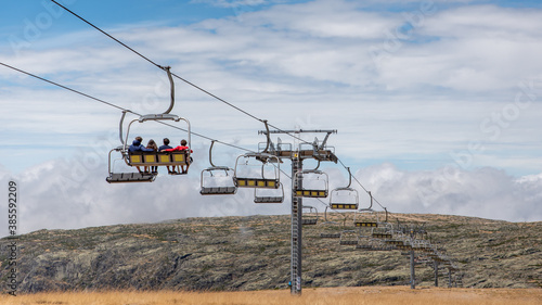 Older couple on ski station chairlift