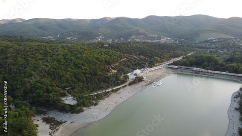 Wallpaper Mural turquoise lake from the air with mountains in the background Torontodigital.ca