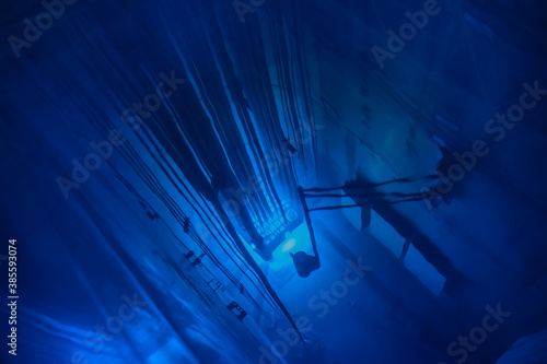 Blue glow water of nuclear reactor core powered, caused by Cherenkov radiation, fuel plates industrial uran