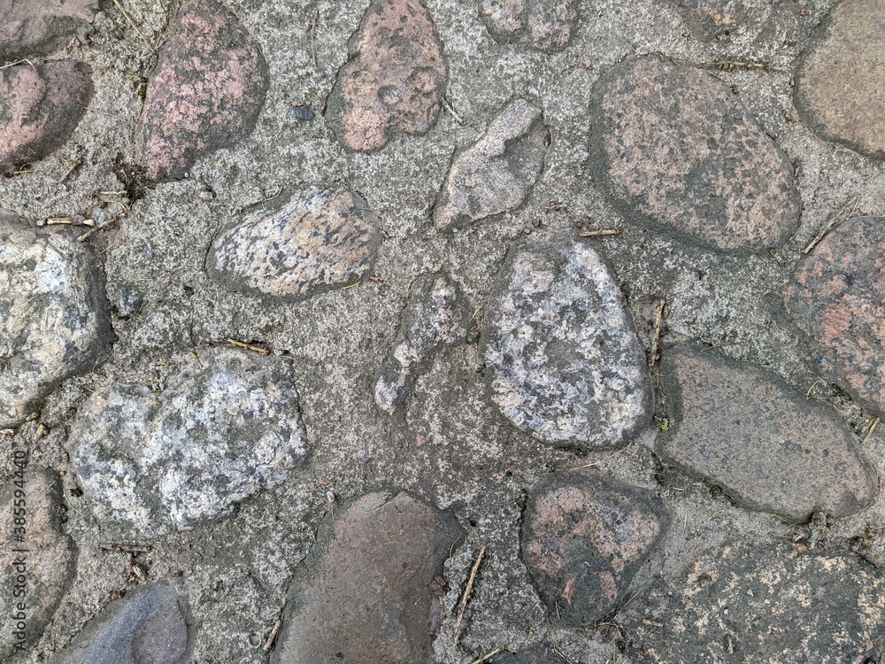 texture and background of stones rolled into the ground texture and background of stones rolled into the ground