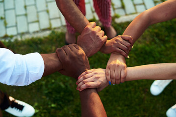 Black people with hands joined. Black people support each other.