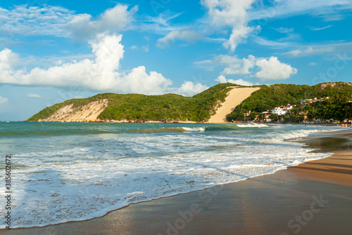 Ponta Negra beach, with Morro do Careca in the background, in the late afternoon, Natal, Rio Grande do Norte, Brazil on February 19, 2008.