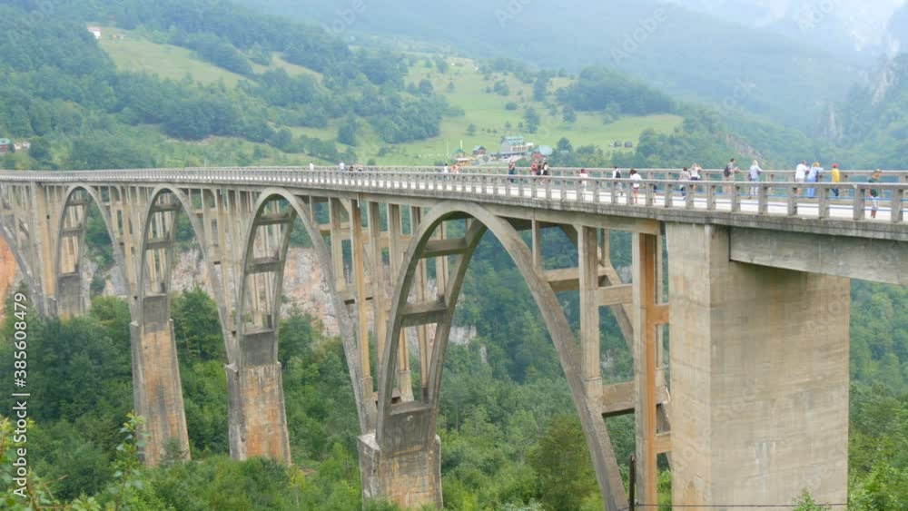 The famous Djurdjevic bridge in Montenegro, on which cars drive and tourists walk. The famous Djurdjevic bridge in Montenegro, on which cars drive and tourists walk.