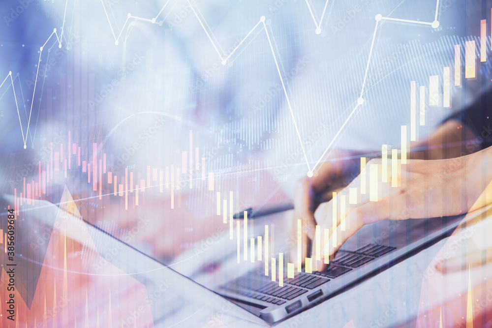 Double exposure of woman hands typing on computer and forex chart hologram drawing. Stock market invest concept. Double exposure of woman hands typing on computer and forex chart hologram drawing. Stock market invest concept.