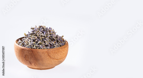 Lavandula - Dried lavender flowers in the wooden bowl