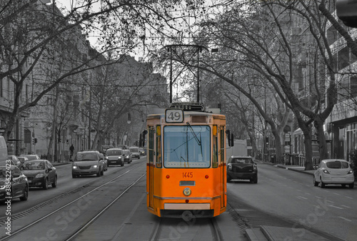 An old yellow tram on the streets of Budapest. Budapest in winter