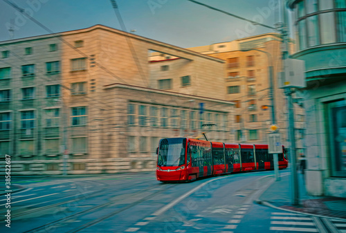 View of a moving modern tram in motion blur. Tram moving on a street of Bratislava. 