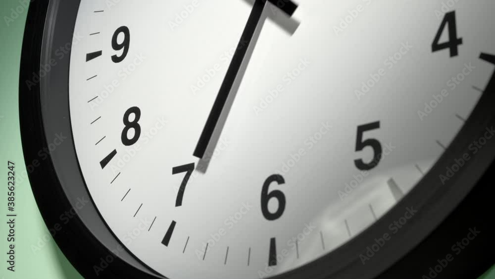 Clock Face in Time Lapse on Light Green Wall in Office
